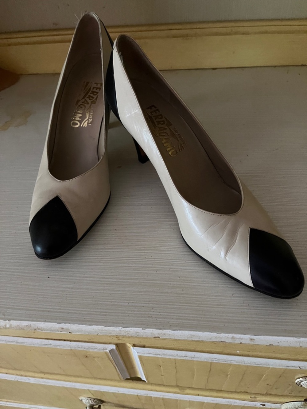 Salvatore Ferragamo Cream Pumps with Black Cap Toe